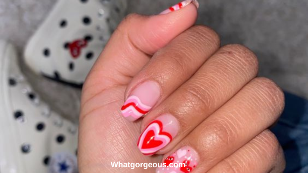 10. Cute Red Glitter Hearts on Neutral Nude Pink Nails whatgorgeous.com