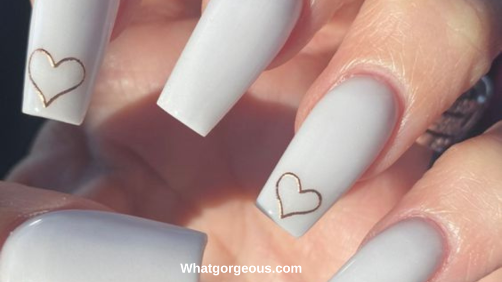 15. Nude Nails With Heart Design whatgorgeous.com