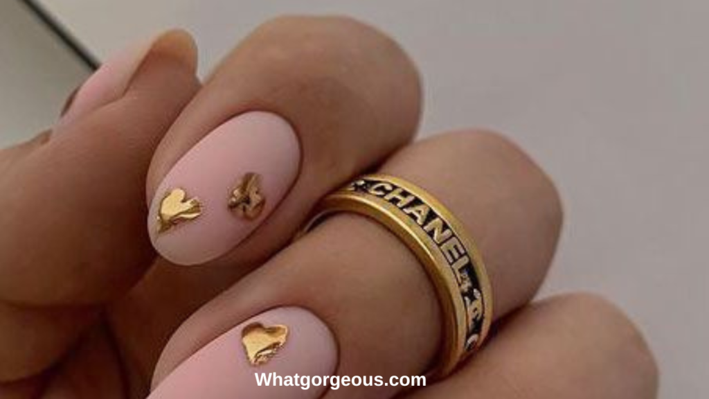 18. Nude and Ruby Heart Nails whatgorgeous.com