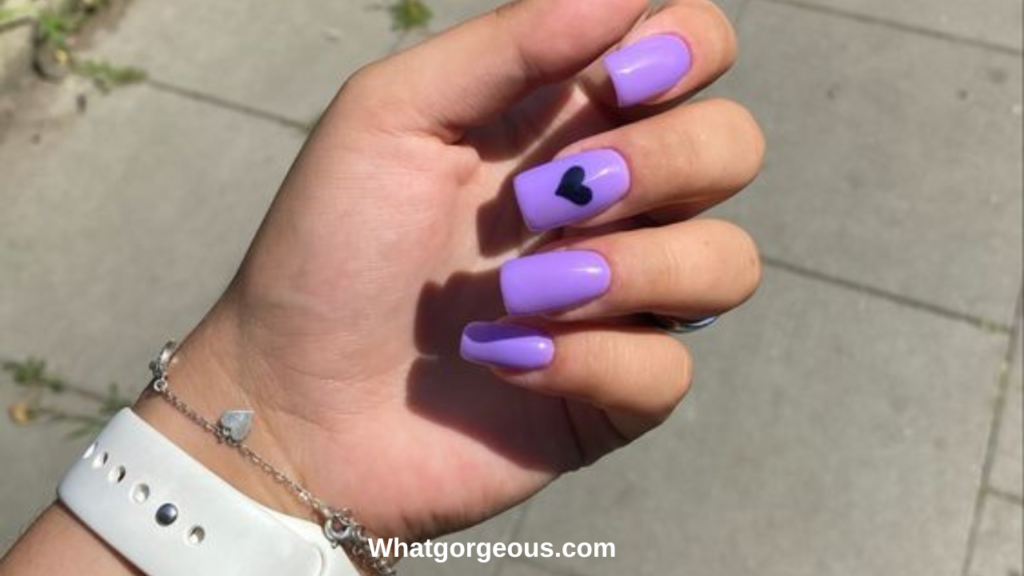 8. Purple Gel Nails with White Hearts whatgorgeous.com