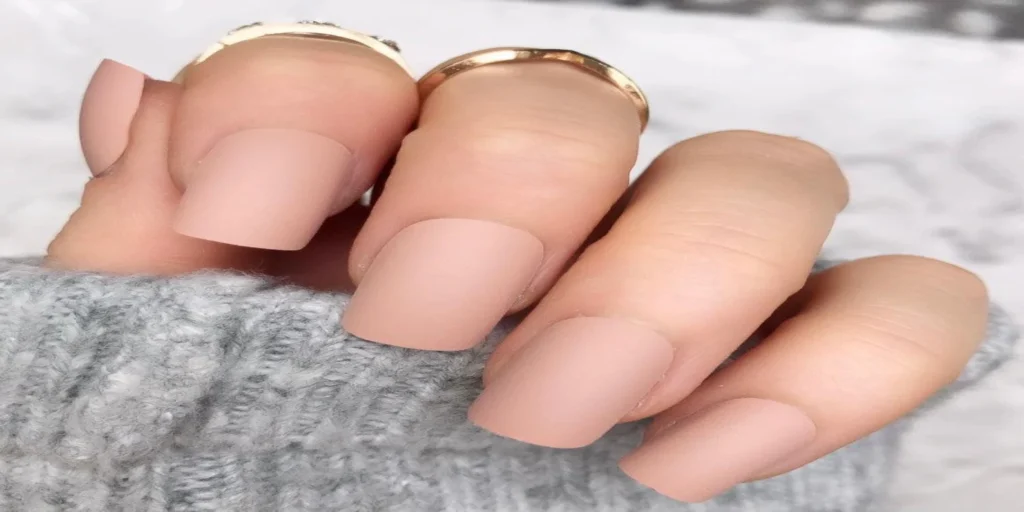 "Matte nude nails ideas: Elegant, understated nail designs perfect for any occasion."